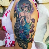 Old school magical colored shoulder tattoo of mystical woman with flowers and book