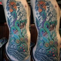 Old school multicolored massive octopus with ship tattoo on side