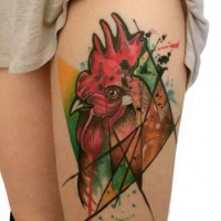 Old school multicolored thigh tattoo of cock head