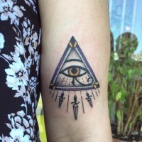 Old school painted colored forearm tattoo of triangle stylized with eye of Horus