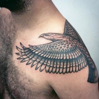 Old school style black and white eagle tattoo on shoulder
