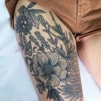 Old school style black and white flowers tattoo on thigh