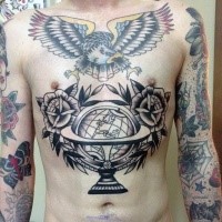 Old school style black ink belly tattoo of big globe with roses and colored eagle