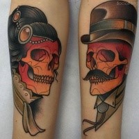 Old school style colored arm tattoo of woman and man skeleton