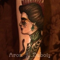 Old school style colored arm tattoo of creepy woman portrait