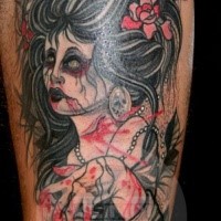 Old school style colored arm tattoo of zombie woman with flowers