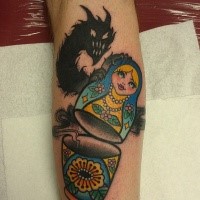 Old school style colored arm tattoo of Matryoshka doll with ghost