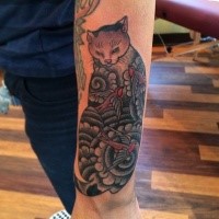 Old school style colored arm tattoo of fantasy cat with birds