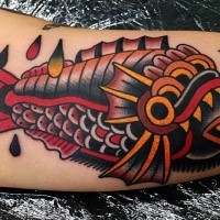Old school style colored biceps tattoo of demonic fish