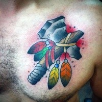Old school style colored chest tattoo of Indian axe with feather