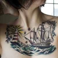 Old school style colored collarbone tattoo of sailing ship with lighthouse