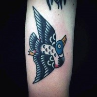 Old school style colored duck tattoo on arm