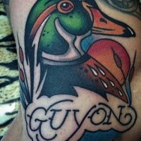 Old school style colored duck with lettering tattoo