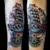 Old school style colored globe with sailing ship and roses