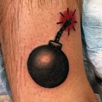 Old school style colored going bomb tattoo on man's arm