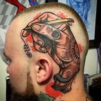 Old school style colored head tattoo of human hand with pencil