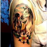 Old school style colored Indian woman with horse portrait tattoo on shoulder combined with flower