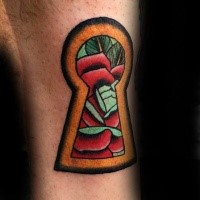 Old school style colored key hole tattoo combined with red rose
