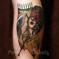 Old school style colored leg tattoo of woman with flowers