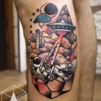 Old school style colored leg tattoo of alien ship with astronaut in desert