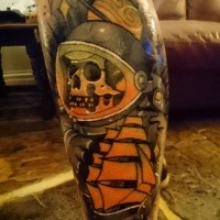 Old school style colored leg tattoo of of astronaut with sailing ship