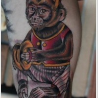 Old school style colored little cute monkey tattoo on leg