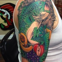Old school style colored massive fish with fruits half sleeve tattoo