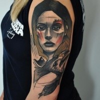 Old school style colored shoulder tattoo of woman face with eagle