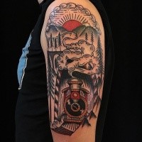 Old school style colored shoulder tattoo of old train with mountain tunnel and sun