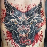 Old school style colored side tattoo of bloody wolf head