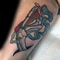 Old school style colored tattoo of skeleton hand with burning candle