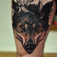 Old school style colored thigh tattoo of wolf with mystic eye