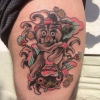 Old school style colored thigh tattoo of cute monkey with fish