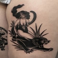 Old school style colored thigh tattoo of sexy woman with black panther