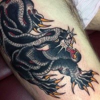 Old school style colored thigh tattoo of black panther with large claws
