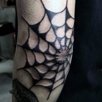 Old school style dark black ink spiderweb detailed elbow tattoo