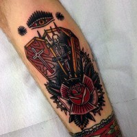 Oldschool Stil mehrfarbiger Sarg mit Skelett und Blumen Tattoo am Bein