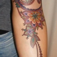 Old school style painted and colored big floral tattoo on sleeve