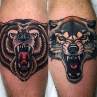 Tatuajes en las piernas, caras de oso y lobo furiosos en estilo old school
