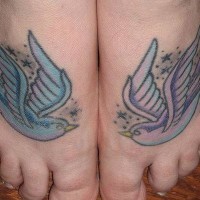 Old school twins foot tattoo with white doves
