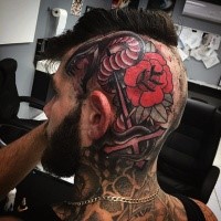 Old school usual designed and colored rose flower with snake and dagger tattoo on head