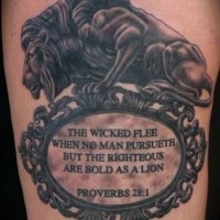 Old statue like colored lion tattoo stylized with lettering
