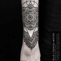 Old style black and white flower shaped wrist armor tattoo