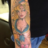 Old style cartoons like colored seductive pin up girl tattoo on arm