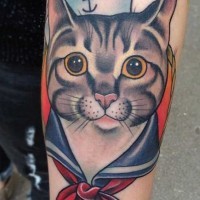 Old style colored cat in sailor suit funny forearm tattoo