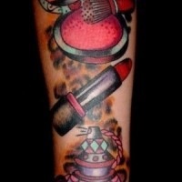 Old style colored various cosmetics tattoo on arm