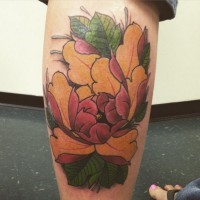 Old style painted colored leg tattoo of beautiful flower