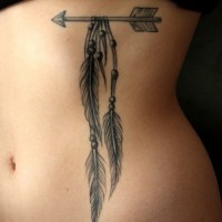 One indian arrow tattoo with feathers and beads