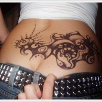 Original abstract patterns tattoo on lower back