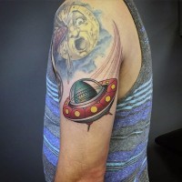 Original cartoon like colored alien ship tattoo on shoulder with Moon